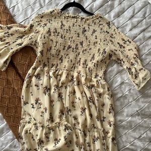 Midi length.Beige (with flowers). Brand new, has a tag. Size XL. From Jessakae.